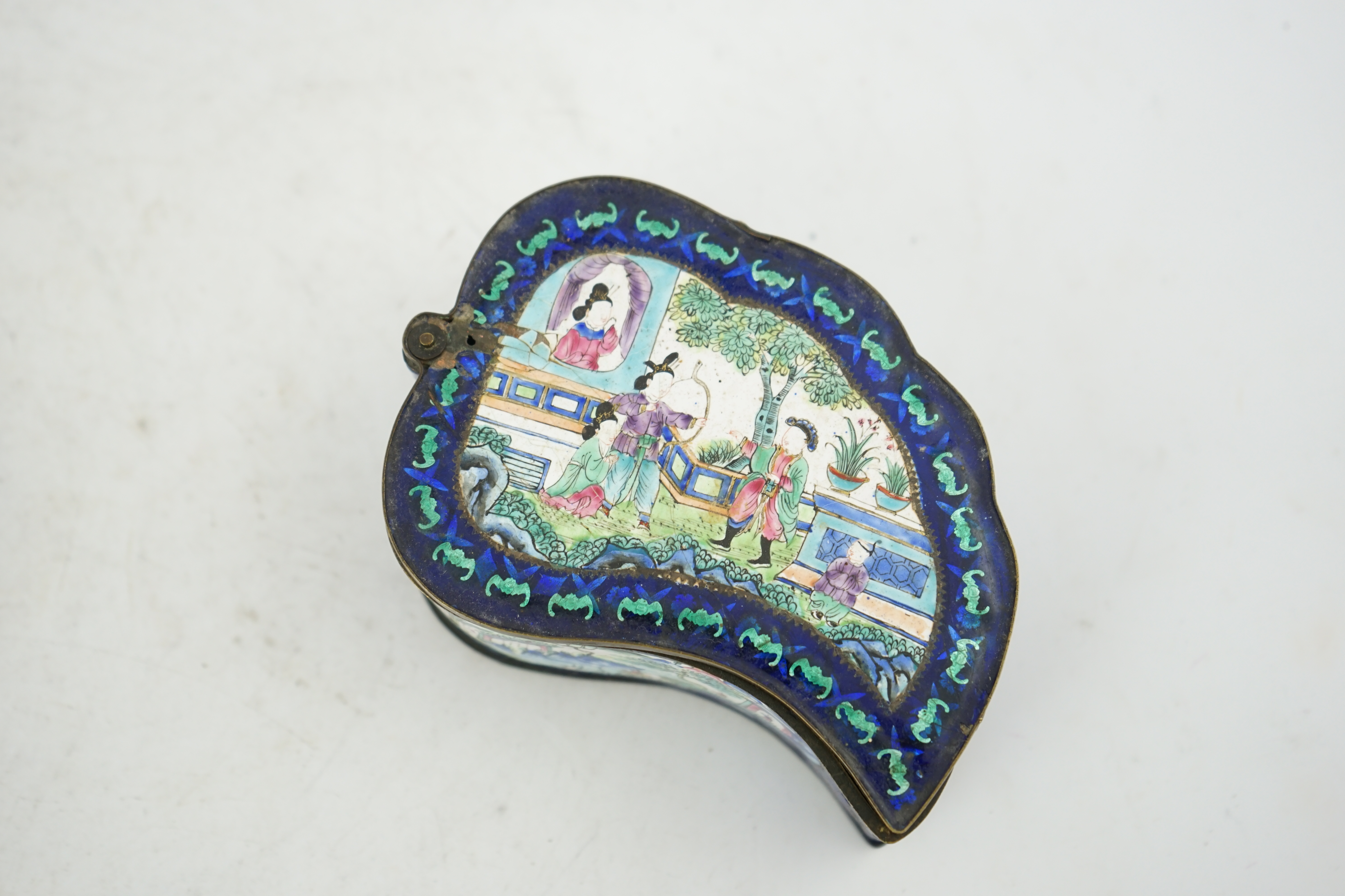 Two Chinese Guangzhou enamel boxes and a similar petal lobed dish, Daoguang period